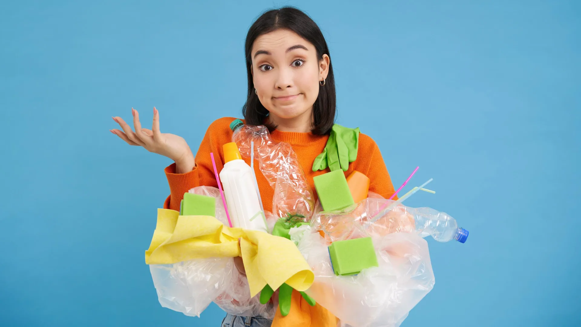 confused-asian-woman-plasatic-trash-recycling-1 Recycling Is Not a Climate Distraction